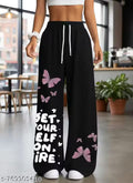 Woman and girls pants shown in the image are black in colour with pink butterflies print and pants